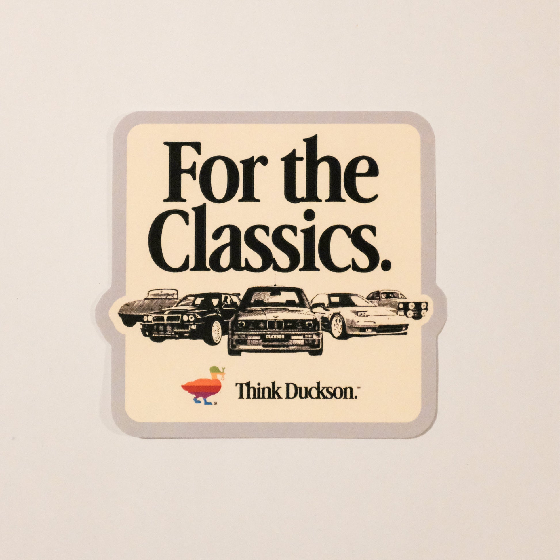 Vintage-style advertisement for Duckton with classic cars and text 'For the Classics.'